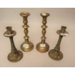 Pair of 19th Century bronze turned column candlesticks together with a pair of brass candlesticks