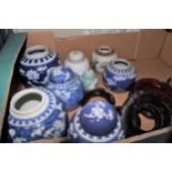 Eight various Chinese ginger jars, some with covers and hardwood stands