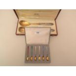 Cased set of six Danish silver gilt enamel decorated coffee spoons together with a cased pair of