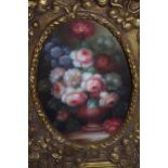 Small modern oil on panel, still life of flowers, oval mounted, 6.5ins x 4.25ins together with a