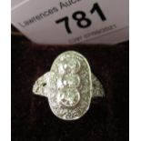 Platinum oval diamond set cluster ring, approximately 1ct total