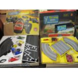 Boxed Triang Minic Motorway set together with a boxed Scalextric Set 31