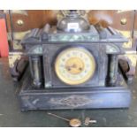 19th Century black slate and green flecked marble two train mantel clock