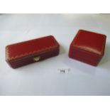 Two Cartier red leather presentation boxes