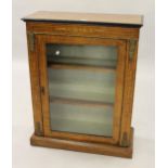 19th Century walnut inlaid and ormolu mounted pier cabinet with a single glazed panel door, 29ins