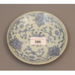 Small Chinese porcelain circular dish decorated with a stylised floral design, painted mark to the