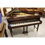 Mahogany cased baby grand piano by George Russell, London, Serial No. 1451, raised on twin square