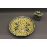 Chinese epublic circular shallow dish decorated with dragons on a yellow ground, 13ins diameter,