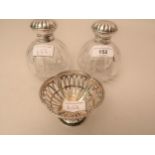 Pair of silver mounted glass perfume decanters, together with a small silver pedestal bonbon dish
