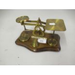 Pair of mahogany and brass letter scales with weights, 8ins wide