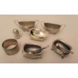 Six various silver condiments, together with a silver napkin ring