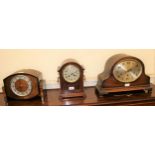 Edwardian mahogany mantel clock having silvered dial with two train movement striking on a gong,