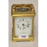 Good quality Mappin & Webb gilt brass carriage clock, the enamel dial with Roman numerals, 6.5ins