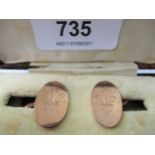 Pair of 9ct rose gold scouting cufflinks with fleur de lys emblem, in original box, 4.8g