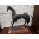 Mid 20th Century welded steel sculpture of a horse on a rectangular wooden plinth base, signed