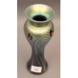 Iridescent glass Okra vase, No. 24 of 1000, by Robert Goldby, decorated with peacock feathers, 25.