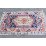 Modern Turkish rug with a hooked medallion and all-over design with borders in shades of blue, cream