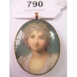 George III oval pendant inset with a painted portrait of a lady