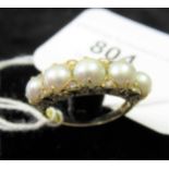 18ct Gold ring set five pearls and diamond chips