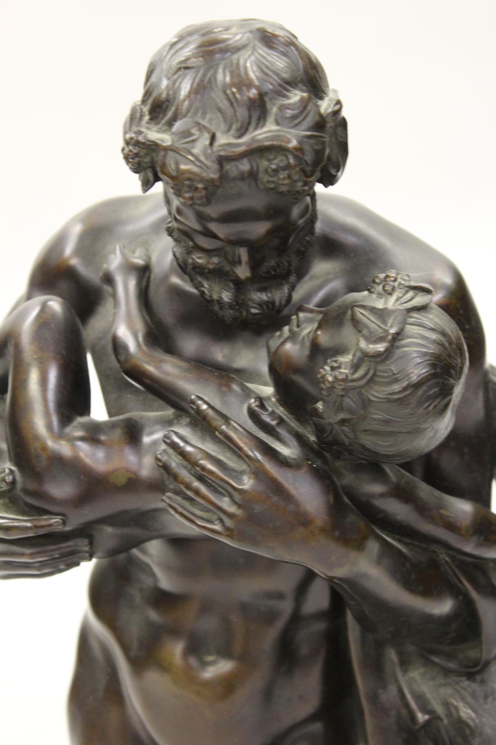 19th Century dark patinated bronze figure of a faun carrying a child beside a tree stump, on an - Image 2 of 8