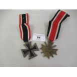 Third Reich Iron Cross 1939 with ribbon, together with a War Merit Cross 1939 with ribbon