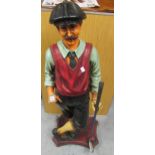 Late 20th Century painted resin figure of an early golfer holding a modern golf club, 40ins high