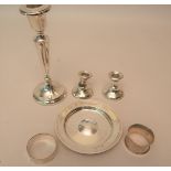 Small English silver alms type dish, pair of silver dwarf candlesticks (at fault), similar single
