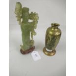 Chinese green carved soapstone figure of an Immortal together with an Eastern floral embossed