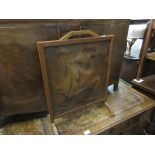 Arts and Crafts oak firescreen inset with an embossed leather panel of a galleon