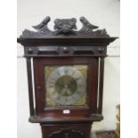 Unusual small oak longcase clock, the square hood with floral surmount and flanking pilasters