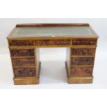 Small Victorian mahogany twin pedestal desk, the green tooled leather inset top above nine drawers