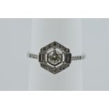 Platinum hexagonal ring set brilliant and baguette cut diamonds