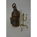 Brass rush light and a tin hand held lantern The lantern may be antique (possibly 19th Century)