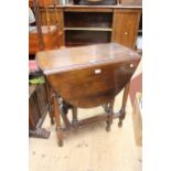 1930's Rectangular oak drop-leaf dining table on barley twist supports