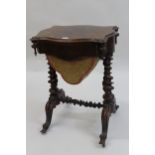 Victorian rosewood rectangular shaped top work table, the frieze drawer above a pull-out wool bag