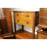 Edwardian mahogany and satinwood crossbanded two drawer chest on square cut moulded supports