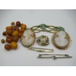 Two cameo brooches, two bar brooches, turquoise set brooch, modern jade and gilt metal bracelet