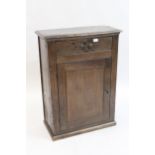 18th Century oak dwarf cupboard, the moulded top above a single drawer and a panel door below on a