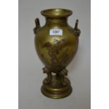 Late 19th Century Japanese gilt bronze two handled amphora shaped vase on tripod and circular plinth