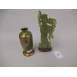Chinese green carved soapstone figure of an Immortal together with an Eastern floral embossed