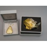 Small Lalique amber glass model of a fish, 2.5ins wide, in original box together with a Lalique