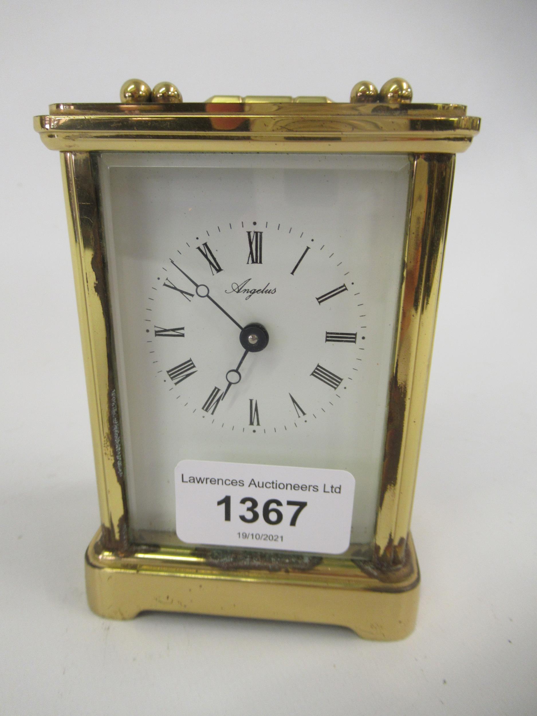 20th Century English gilt brass carriage clock, the enamel dial with Roman numerals, inscribed