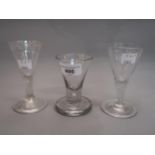 Antique firing glass with bubble stem together with two antique engraved conical glasses