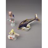Herend porcelain figure of an owl, a Derby dolphin paperweight and a porcelain half doll figure