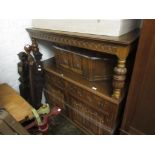 Reproduction oak court cupboard, canopy top with single panelled door, having carved decoration