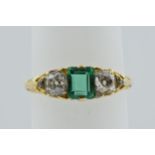 18ct Yellow gold three stone emerald and diamond ring, the emerald approximately 6mm x 4.5mm,