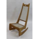 Jeremy K. Broun, 1970's hardwood rocking chair with string back and seat Good condition, no