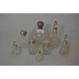 Group of eight various silver mounted glass dressing table bottles