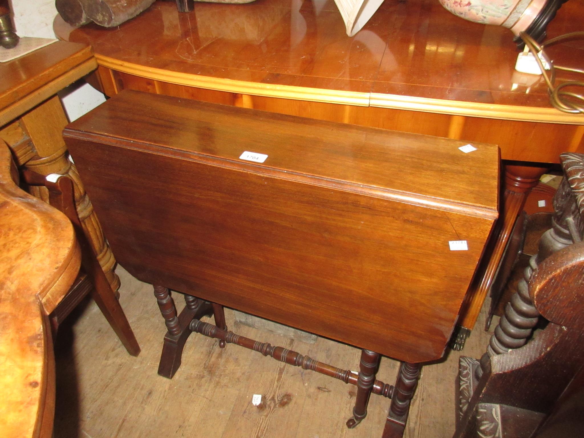 Late 19th Century walnut rectangular drop-leaf Sutherland table on turned supports, together with