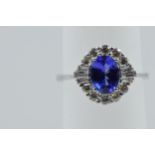 18ct White gold cushion cut sapphire and diamond cluster ring, the sapphire approximately 2.50ct